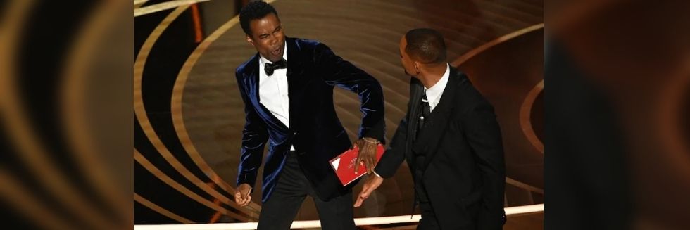 Will Smith Slaps Comedian Chris Rock On Oscars Stage For Joking About Wife’s Alopecia